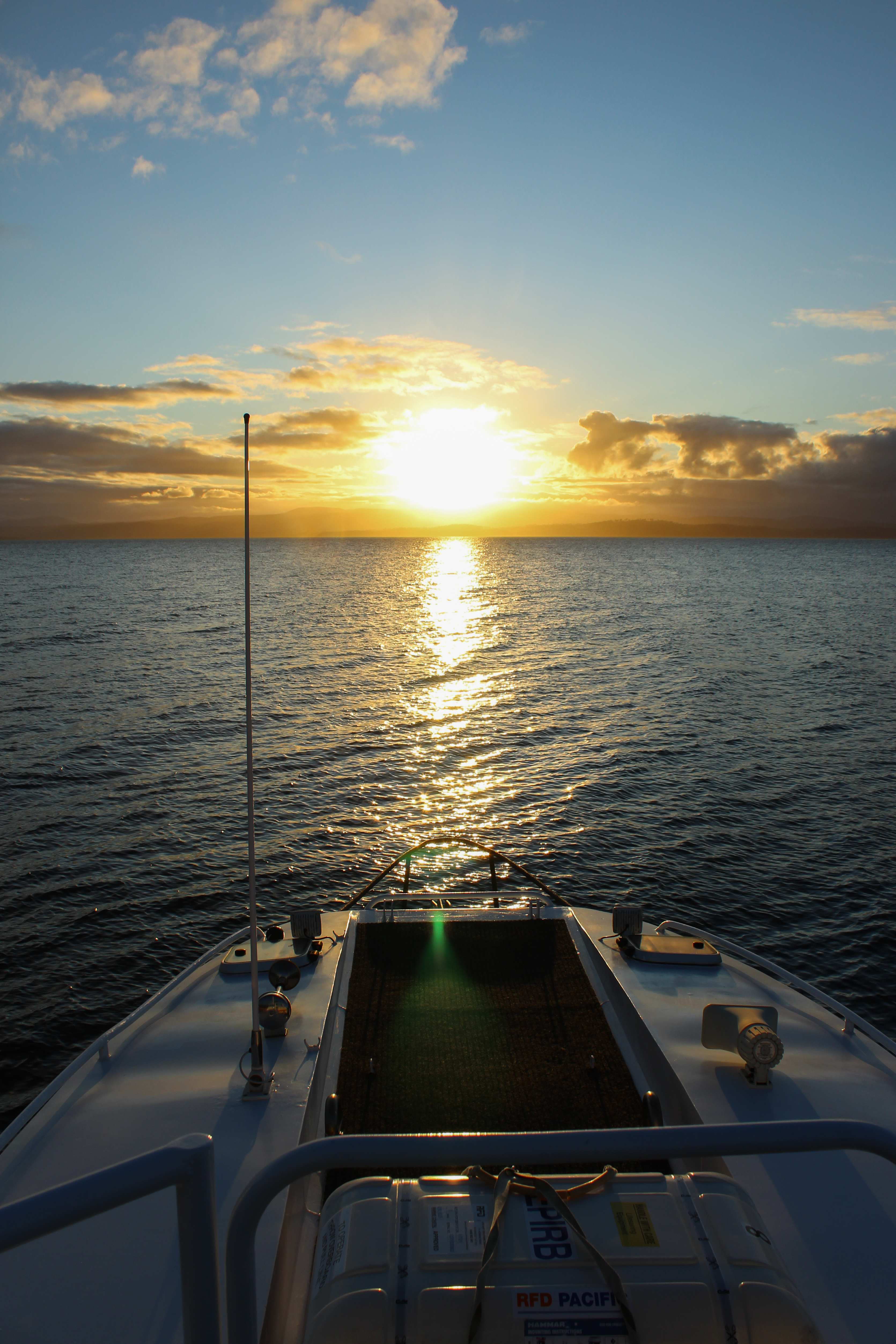 Sunset off the bow of the Spirit of Maria